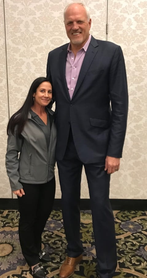 Ortho coordinator with 2018 Medical Education Day guest speaker, Mark Eaton.